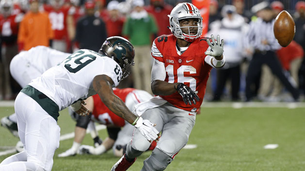 J.T. Barrett (16) is the main man at QB this season for Ohio State. Photo Credit: Geoff Burke-USA TODAY Sports