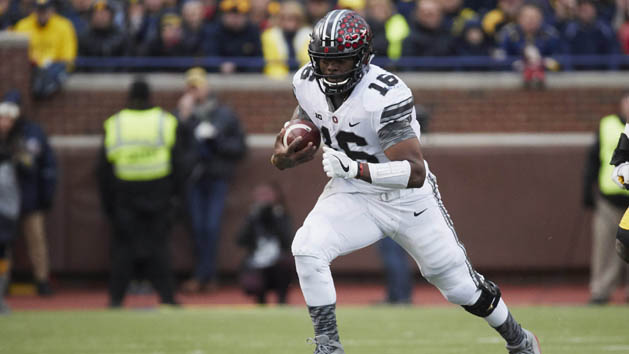 Nov 25, 2017; Ann Arbor, MI, USA; Ohio State Buckeyes quarterback J.T. Barrett (16) rushes in the first half against the Michigan Wolverines at Michigan Stadium. Photo Credit: Rick Osentoski-USA TODAY Sports