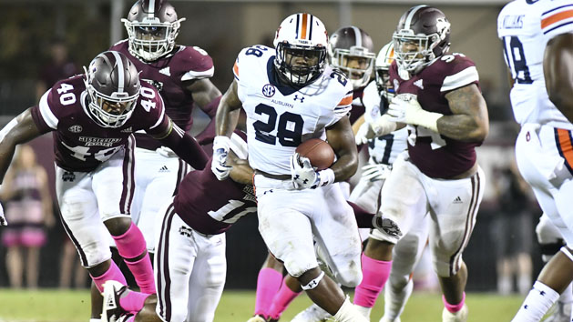 Oct 6, 2018; Starkville, MS, USA; Auburn Tigers running back JaTarvious Whitlow (28) runs the ball against the Mississippi State Bulldogs during the third quarter at Davis Wade Stadium. Photo Credit: Matt Bush-USA TODAY Sports