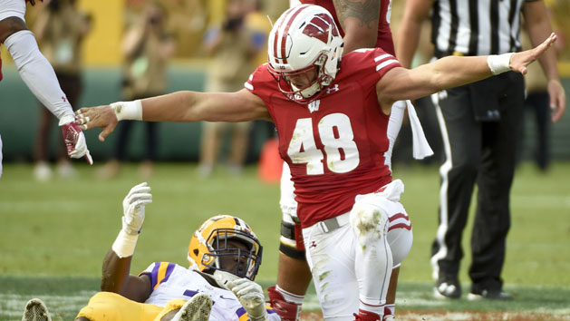 Sep 3, 2016; Green Bay, WI, USA; Wisconsin Badgers linebacker Jack Cichy (48) reacts after stopping LSU Tigers running back Leonard Fournette (7) short of a first down in the second quarter at Lambeau Field. Photo Credit: Benny Sieu-USA TODAY Sports