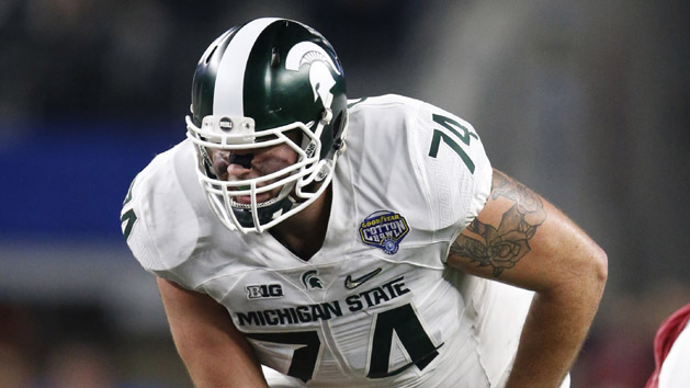 Dec 31, 2015; Arlington, TX, USA; Michigan State Spartans tackle Jack Conklin (74) in action against Alabama Crimson Tide in the second half of the 2015 CFP semifinal at the Cotton Bowl at AT&T Stadium. at AT&T Stadium. Mandatory Credit: Matthew Emmons-USA TODAY Sports