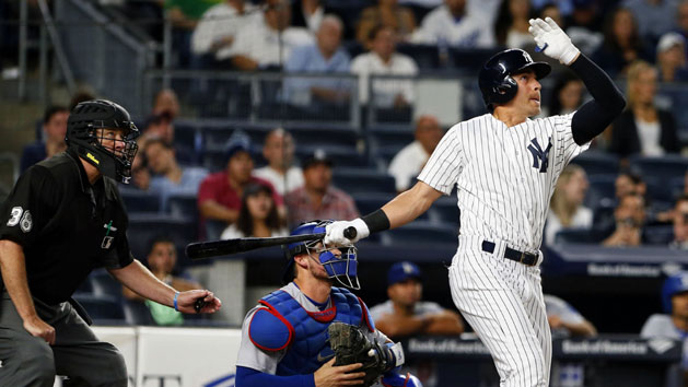 Sep 13, 2016; Bronx, NY, USA; New York Yankees center fielder Jacoby Ellsbury (22) hits a home run against the Los Angeles Dodgers in the seventh inning at Yankee Stadium. Photo Credit: Noah K. Murray-USA TODAY Sports