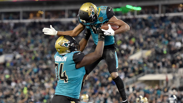 Dec 10, 2017; Jacksonville, FL, USA; Jaguars wide receiver Dede Westbrook (right) celebrates with offensive tackle Cam Robinson (left) after scoring a touchdown against the Seattle Seahawks during the second half at EverBank Field. Photo Credit: Steve Mitchell-USA TODAY Sports
