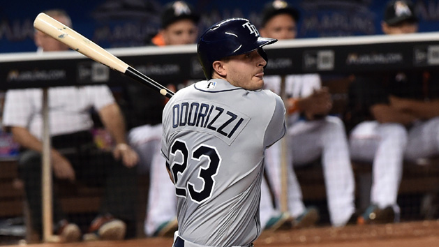 May 24, 2016; Miami, FL, USA; Tampa Bay Rays starting pitcher Jake Odorizzi (23) connects for an RBI single during the second inning against the Miami Marlins at Marlins Park. Photo Credit: Steve Mitchell-USA TODAY Sports