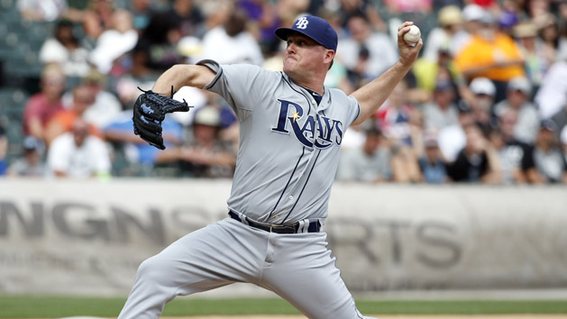 Jake McGee (57) should improve the Rockies shaky bullpen of a year ago. Photo Credit: Kamil Krzaczynski-USA TODAY Sports