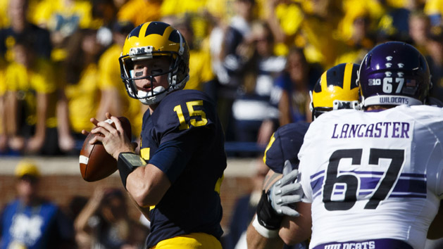 Oct 10, 2015; Ann Arbor, MI, USA; Michigan Wolverines quarterback Jake Rudock (15) drops back to pass in the first quarter against the Northwestern Wildcats at Michigan Stadium. Mandatory Credit: Rick Osentoski-USA TODAY Sports