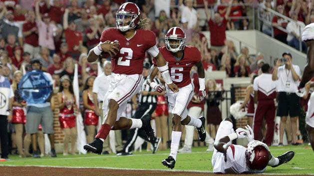 Oct 14, 2017; Tuscaloosa, AL, USA; Alabama Crimson Tide quarterback Jalen Hurts (2) scores a touchdown during the second quarter against Arkansas Razorbacks at Bryant-Denny Stadium. Photo Credit: Marvin Gentry-USA TODAY Sports