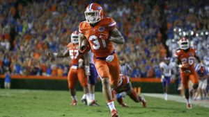 Florida suspends QB Harris, CB Tabor for a game
