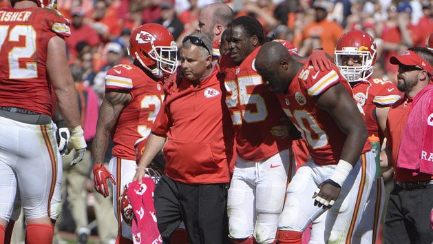 Oct 11, 2015; Kansas City, MO, USA; Kansas City Chiefs running back Jamaal Charles (25) is helped off the field against the Chicago Bears in the second half at Arrowhead Stadium. Chicago won the game 18-17. Mandatory Credit: John Rieger-USA TODAY Sports