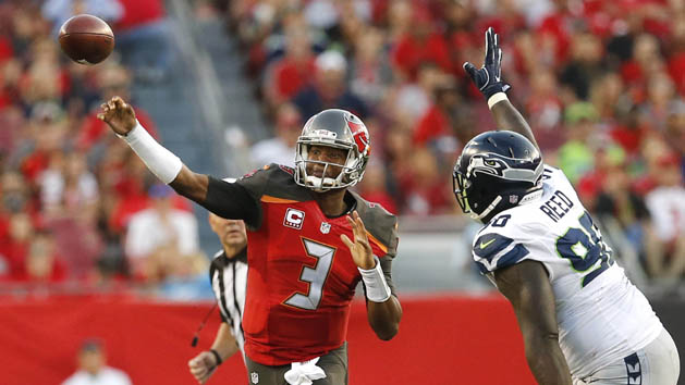 Nov 27, 2016; Tampa, FL, USA; Tampa Bay Buccaneers quarterback Jameis Winston (3) throws a pass as Seattle Seahawks defensive tackle Jarran Reed (90) closes in during the second quarter of an NFL football game at Raymond James Stadium. Photo Credit: Reinhold Matay-USA TODAY Sports