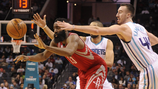 Feb 9, 2017; Charlotte, NC, USA; Houston Rockets guard James Harden (13) passes the ball as he is defended by Charlotte Hornets forward center Frank Kaminsky (44) during the fist half of the game at the Spectrum Center. Photo Credit: Sam Sharpe-USA TODAY Sports