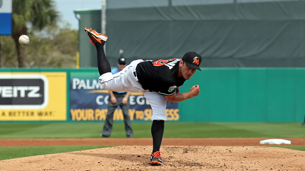 Mar 4, 2016; Jupiter, FL, USA; Miami Marlins starting pitcher Jarred Cosart (59) delivers a pitch against the Washington Nationals during a spring training game at Roger Dean Stadium. Mandatory Credit: Steve Mitchell-USA TODAY Sports