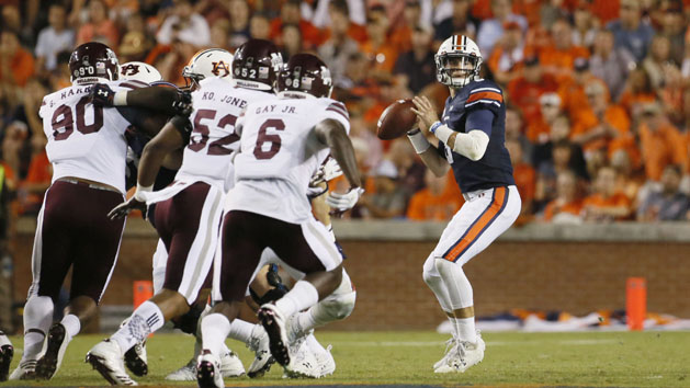 Sep 30, 2017; Auburn, AL, USA; Mississippi State Bulldogs defenders close in on Auburn Tigers quarterback Jarrett Stidham (8) during the fourth quarter at Jordan-Hare Stadium. Photo Credit: John Reed-USA TODAY Sports