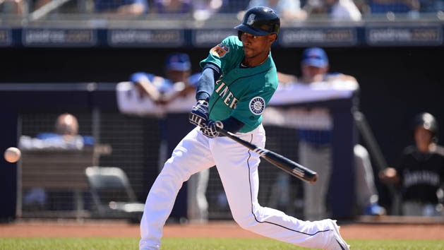 Mar 10, 2017; Peoria, AZ, USA; Seattle Mariners center fielder Jarrod Dyson (1) swings at a pitch against the Chicago Cubs during the first inning at Peoria Stadium. Photo Credit: Joe Camporeale-USA TODAY Sports