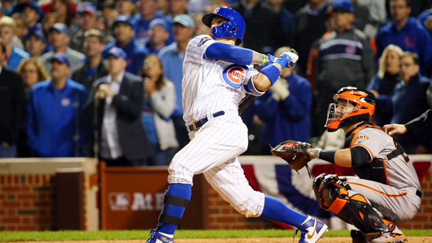 Oct 7, 2016; Chicago, IL, USA; Chicago Cubs second baseman Javier Baez (9) hits a home run against the San Francisco Giants during the eighth inning during game one of the 2016 NLDS playoff baseball series at Wrigley Field. Photo Credit: Jerry Lai-USA TODAY Sports