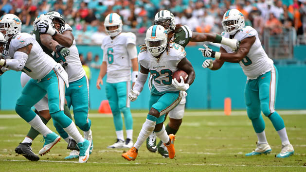 Oct 22, 2017; Miami Gardens, FL, USA; Miami Dolphins running back Jay Ajayi (23) runs the ball against the New York Jets during the first half at Hard Rock Stadium. Photo Credit: Jasen Vinlove-USA TODAY Sports