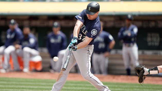 May 26, 2019; Oakland, CA, USA; Seattle Mariners right fielder Jay Bruce (32) hits a single against the Oakland Athletics during the fourth inning at Oakland Coliseum. Photo Credit: Stan Szeto-USA TODAY Sports