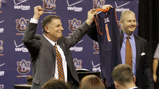 Mar 18, 2014; Auburn, AL, USA; Auburn Tigers head basketball coach Bruce Pearl is welcomed by athletics director Jay Jacobs during his introductory press conference in the Auburn Arena on Tuesday. Photo Credit: John Reed-USA TODAY Sports