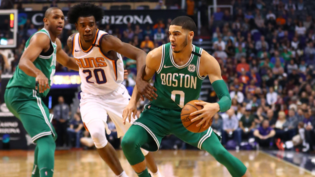 Mar 26, 2018; Phoenix, AZ, USA; Boston Celtics forward Jayson Tatum (0) controls the ball against Phoenix Suns guard Josh Jackson (20) in the second half at Talking Stick Resort Arena. Photo Credit: Mark J. Rebilas-USA TODAY Sports