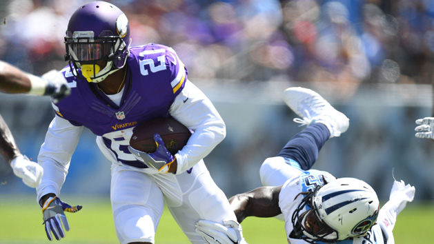 Sep 11, 2016; Nashville, TN, USA; Minnesota Vikings running back Jerick McKinnon (21) runs for a short gain after a missed tackle by Tennessee Titans linebacker Sean Spence (55) during the firs thalf at Nissan Stadium. Photo Credit: Christopher Hanewinckel-USA TODAY Sports