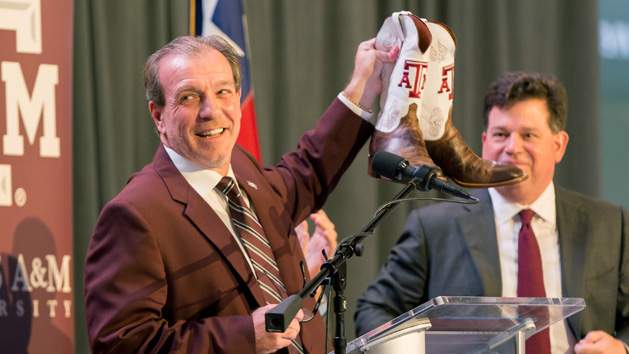 Dec 4, 2017; College Station, TX, USA; Texas A&M head coach Jimbo Fisher was gifted a pair of custom Texas A&M cowboy boots at the press conference held at the Hall of Champions in Kyle Field. Photo Credit: C. Morgan Engel-USA TODAY Sports