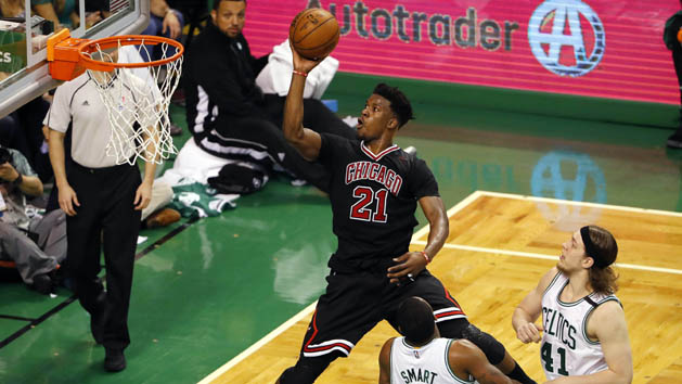 Apr 16, 2017; Boston, MA, USA; Chicago Bulls forward Jimmy Butler (21) goes to the basket past Boston Celtics guard Marcus Smart (36) and center Kelly Olynyk (41) during the third quarter in game one of the first round of the 2017 NBA Playoffs at TD Garden. Photo Credit: Winslow Townson-USA TODAY Sports