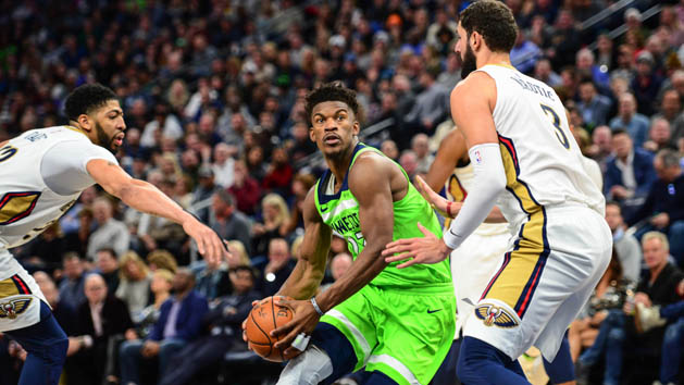 Feb 3, 2018; Minneapolis, MN, USA; Minnesota Timberwolves guard Jimmy Butler (23) goes to the basket as New Orleans Pelicans forward Nikola Mirotic (3) and forward Anthony Davis (23) defend during the second half at Target Center. The Timberwolves won 118-107. Photo Credit: Jeffrey Becker-USA TODAY Sports