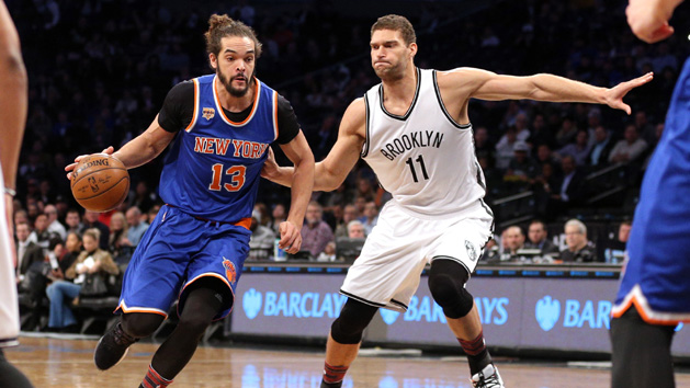 Feb 1, 2017; Brooklyn, NY, USA; New York Knicks center Joakim Noah (13) drives against Brooklyn Nets center Brook Lopez (11) during the first quarter at Barclays Center. Photo Credit: Brad Penner-USA TODAY Sports
