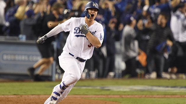 Oct 31, 2017; Los Angeles, CA, USA; Los Angeles Dodgers center fielder Joc Pederson (31) runs the bases after hitting a home run against the Houston Astros in the seventh inning in game six of the 2017 World Series at Dodger Stadium. Photo Credit: Robert Hanashiro-USA TODAY Sports