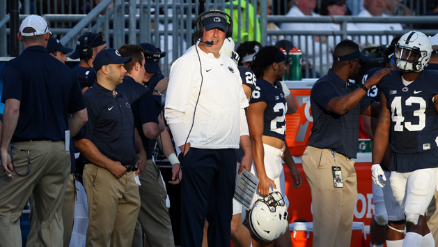 Sep 9, 2017; University Park, PA, USA; Penn State Nittany Lions offensive coordinator and quarterbacks coach Joe Moorhead (center) looks on from the sideline during the fourth quarter against the Pittsburgh Panthers at Beaver Stadium. Penn State defeated Pitt 33-14. Photo Credit: Matthew O'Haren-USA TODAY Sports