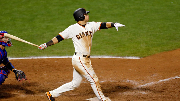 Oct 10, 2016; San Francisco, CA, USA; San Francisco Giants second baseman Joe Panik (12) hits a walk-off RBI double against the Chicago Cubs during the thirteenth inning during game three of the 2016 NLDS playoff baseball series at AT&T Park. The San Francisco Giants won 6-5 in thirteen innings. Photo Credit: John Hefti-USA TODAY Sports