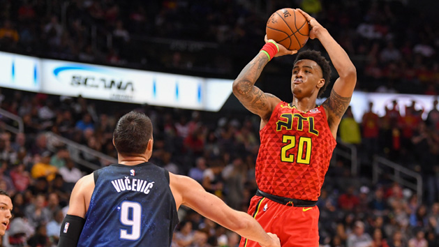 Apr 1, 2018; Atlanta, GA, USA; Atlanta Hawks forward John Collins (20) shoots over Orlando Magic center Nikola Vucevic (9) during the second half at Philips Arena. Photo Credit: Dale Zanine-USA TODAY Sports