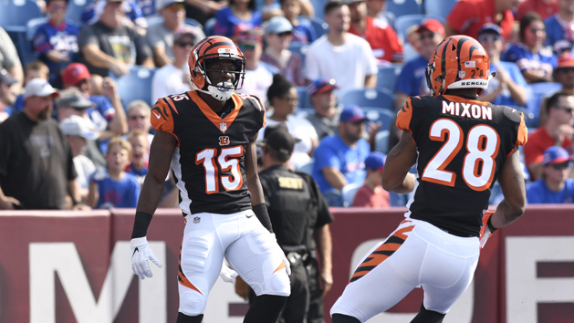 Aug 26, 2018; Orchard Park, NY, USA; Cincinnati Bengals wide receiver John Ross (15) celebrates scoring a touchdown as running back Joe Mixon (28) joins in during the first quarter of a game against the Buffalo Bills at New Era Field. Photo Credit: Mark Konezny-USA TODAY Sports