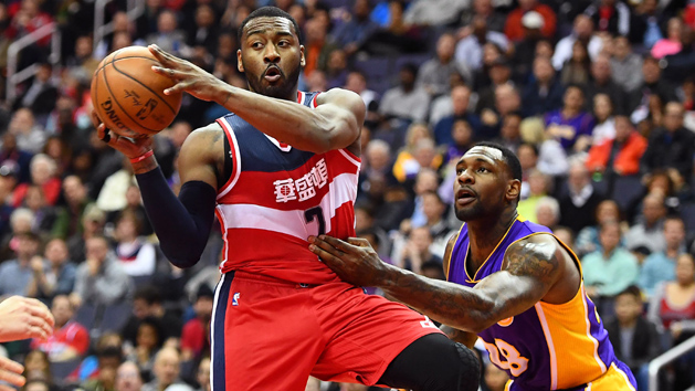 Feb 2, 2017; Washington, DC, USA; Washington Wizards guard John Wall (2) passes the ball as Los Angeles Lakers center Tarik Black (28) looks on during the second half at Verizon Center. Washington Wizards won 116-108. Photo Credit: Brad Mills-USA TODAY Sports