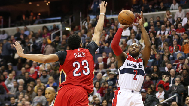 Feb 4, 2017; Washington, DC, USA; Washington Wizards guard John Wall (2) shoots the ball as New Orleans Pelicans forward Anthony Davis (23) defends in the fourth quarter at Verizon Center. The Wizards won 105-91. Photo Credit: Geoff Burke-USA TODAY Sports