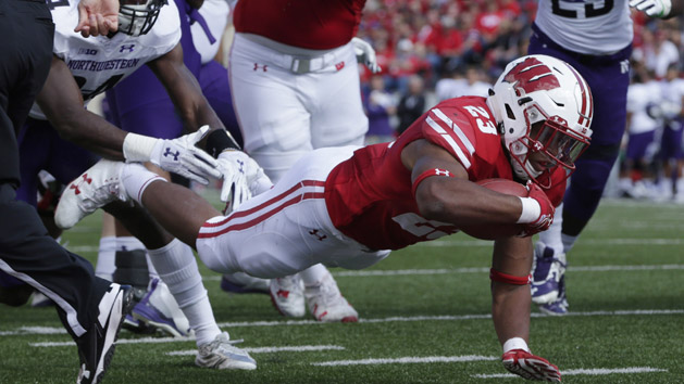 Sep 30, 2017; Madison, WI, USA; Wisconsin running back Jonathan Taylor (23) scores a touchdown on a seven yard run during the first quarter of their game against Northwestern at Camp Randall Stadium. Photo Credit: Mark Hoffman/Milwaukee Journal Sentinel via USA TODAY Sports
