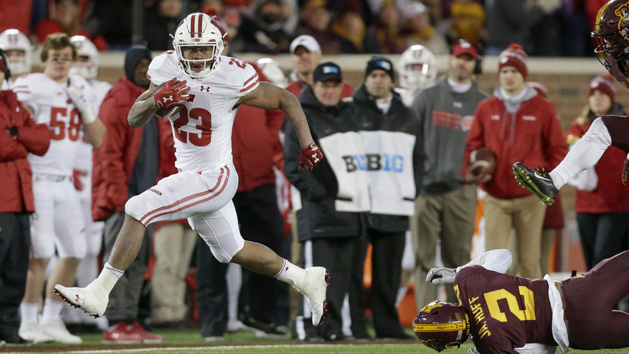 Nov 25, 2017; Minneapolis, MN, USA; Wisconsin Badgers running back Jonathan Taylor (23) scores a long touchdown during the fourth quarter of the Badgers 31-0 win over the Minnesota Golden Gophers at TCF Bank Stadium. Mike De Sisti/Milwaukee Journal Sentinel via USA TODAY NETWORK
