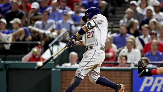 Jun 8, 2016; Arlington, TX, USA; Houston Astros second baseman Jose Altuve (27) hits a two rbi double during the seventh inning against the Texas Rangers at Globe Life Park in Arlington. Photo Credit: Kevin Jairaj-USA TODAY Sports