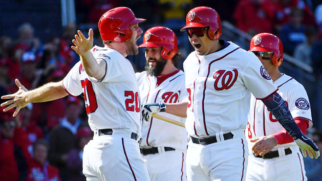 Oct 9, 2016; Washington, DC, USA; Washington Nationals catcher Jose Lobaton (59) celebrates with second baseman Daniel Murphy (20) after hitting a three run home run against the Los Angeles Dodgers during the fourth inning during game two of the 2016 NLDS playoff baseball series at Nationals Park. Photo Credit: Brad Mills-USA TODAY Sports