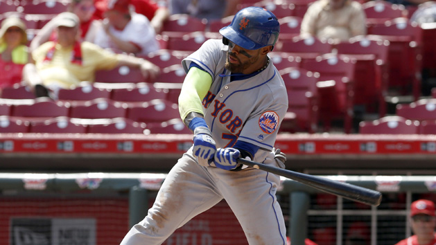 Sep 7, 2016; Cincinnati, OH, USA; New York Mets third baseman Jose Reyes hits a single against the Cincinnati Reds during the seventh inning at Great American Ball Park. Photo Credit: David Kohl-USA TODAY Sports