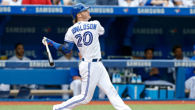May 27, 2016; Toronto, Ontario, CAN; Toronto Blue Jays third baseman Josh Donaldson (20) hits a double against the Boston Red Sox in the third inning at Rogers Centre. Mandatory Credit: Kevin Sousa-USA TODAY Sports