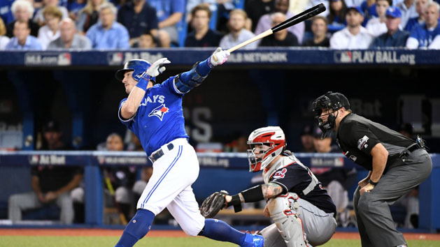 Oct 18, 2016; Toronto, Ontario, CAN; Toronto Blue Jays third baseman Josh Donaldson (20) hits a solo home run during the third inning against the Cleveland Indians in game four of the 2016 ALCS playoff baseball series at Rogers Centre. Photo Credit: Nick Turchiaro-USA TODAY Sports