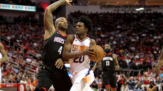Mar 30, 2018; Houston, TX, USA; Phoenix Suns forward Josh Jackson (20) drives to the basket while Houston Rockets forward PJ Tucker (4) defends during the second quarter at Toyota Center. Photo Credit: Erik Williams-USA TODAY Sports