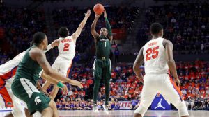 Michigan St. holds off Florida behind Langford, Ahrens