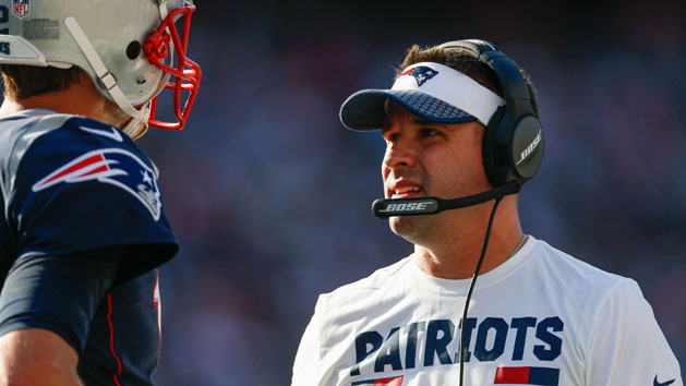 Sep 24, 2017; Foxborough, MA, USA; New England Patriots offensive coordinator Josh McDaniels talks with quarterback Tom Brady (12) on the side line during the second half against the Houston Texans at Gillette Stadium. Photo Credit: Greg M. Cooper-USA TODAY Sports