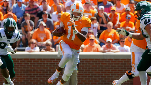 Sep 17, 2016; Knoxville, TN, USA; Tennessee Volunteers quarterback Joshua Dobbs (11) runs the ball against the Ohio Bobcats during the second half at Neyland Stadium. Tennessee won 28 to 19. Photo Credit: Randy Sartin-USA TODAY Sports