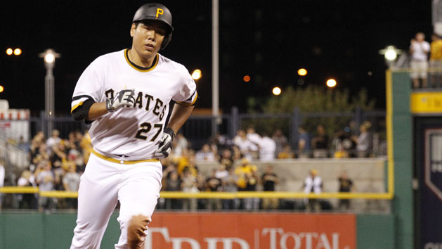 Aug 9, 2015; Pittsburgh, PA, USA; Pittsburgh Pirates third baseman Jung Ho Kang (27) rounds the bases after hitting a three run home run against the Los Angeles Dodgers during the seventh inning at PNC Park. The Pirates won 13-6. Mandatory Credit: Charles LeClaire-USA TODAY Sports