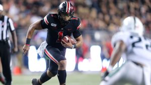 Ohio State QB Fields to play through knee pain