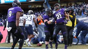 Jackson leads Northwestern to win at Pinstripe Bowl