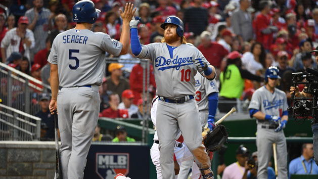 Oct 7, 2016; Washington, DC, USA; Los Angeles Dodgers third baseman Justin Turner (10) is greeted by shortstop Corey Seager (5) after hitting a two run home run against the Washington Nationals in the third inning during game one of the 2016 NLDS playoff baseball series at Nationals Park. Photo Credit: Brad Mills-USA TODAY Sports